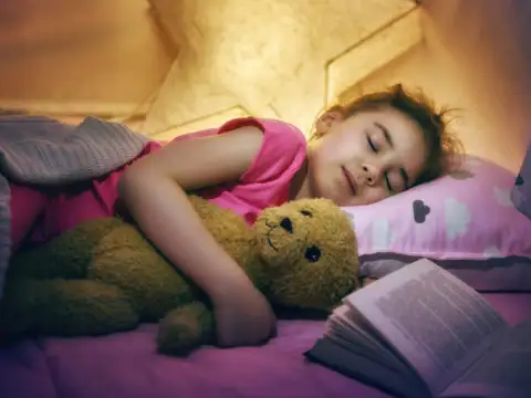 Child napping in tent