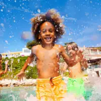 Children playing in a shallow pool