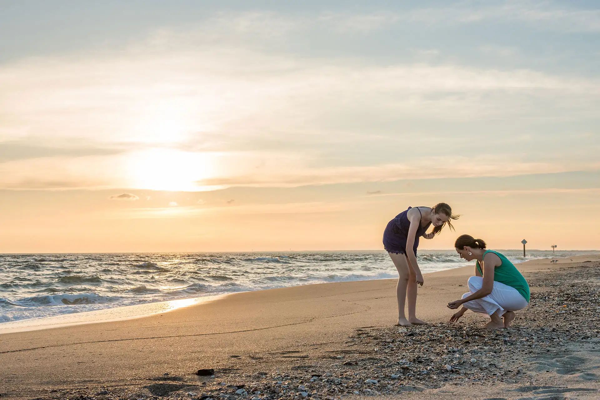 Mother and Daughter on Beach on Bald Head Island, North Carolina; Courtesy of VisitNC.com