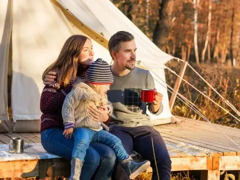 Family Glamping; Courtesy of Dmitry Zimin/Shutterstock.com