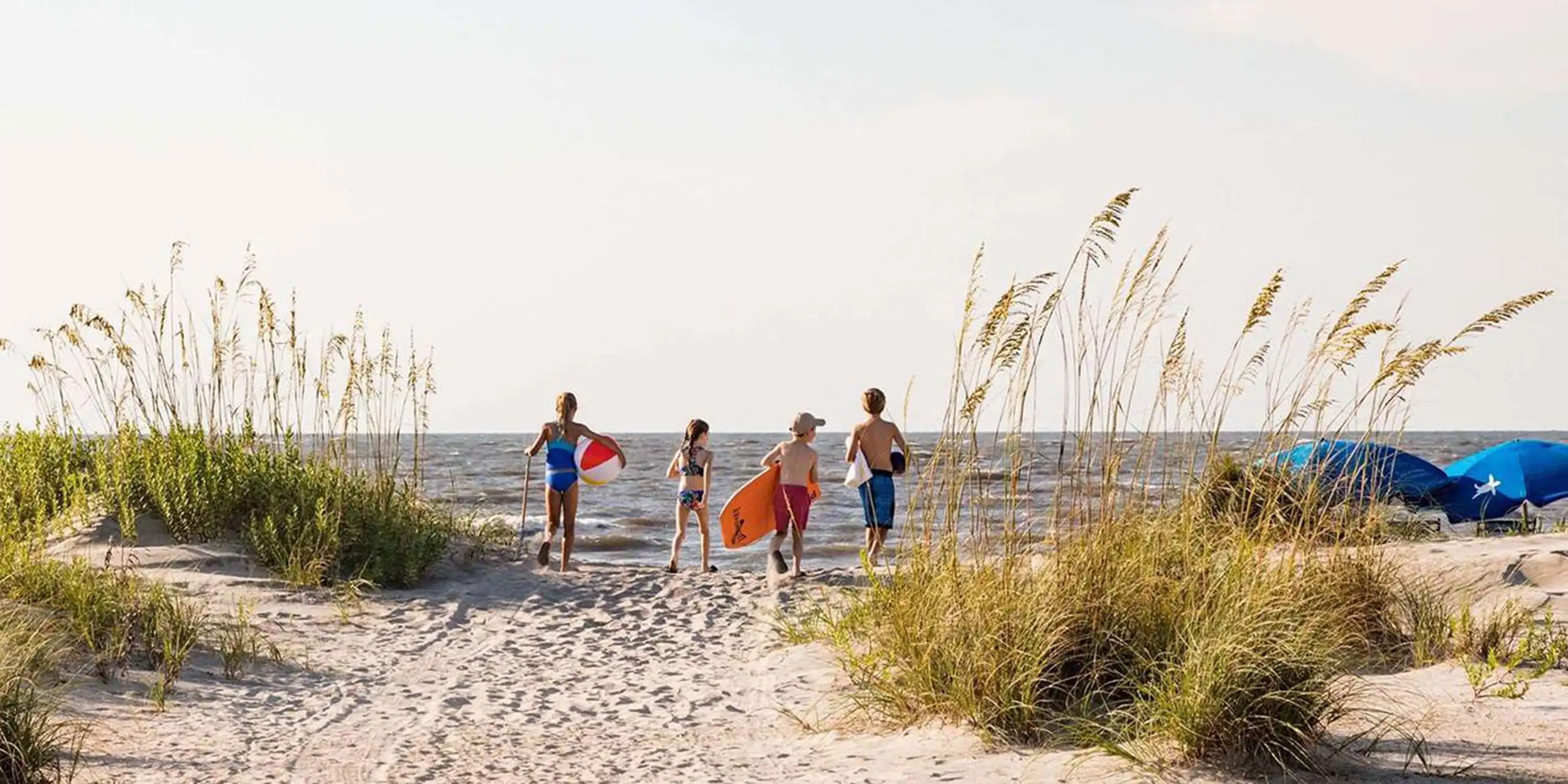 Family on Beach at Wild Dunes Resort in South Carolina