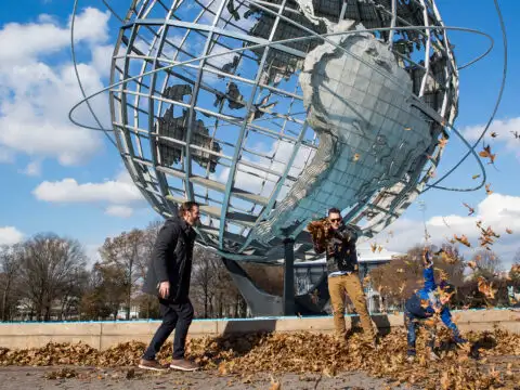 family plays near Flushing Meadows Park in Queens ;Courtesy of NYC & Company