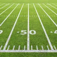 Football Field; Courtesy of EFKS/Shutterstock.com