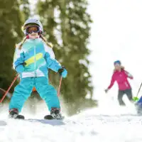 Kids skiing at Keystone Resort in Colorado; Courtesy of Vail Resorts/Daniel Milchev