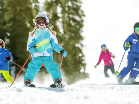 Kids skiing at Keystone Resort in Colorado; Courtesy of Vail Resorts/Daniel Milchev