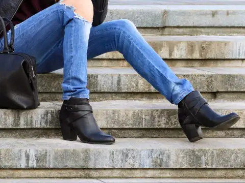 mom wearing booties autumn steps; Courtesy of atdigit /Shutterstock