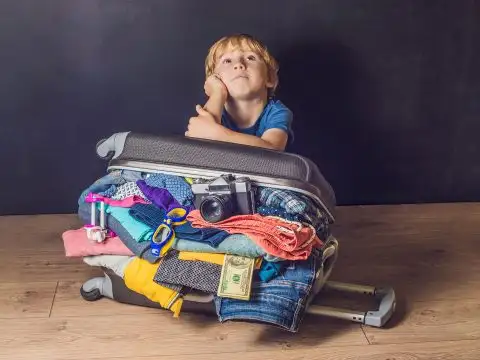 Packing Too Much; Courtesy of Elizaveta Galitckaia/Shutterstock.com