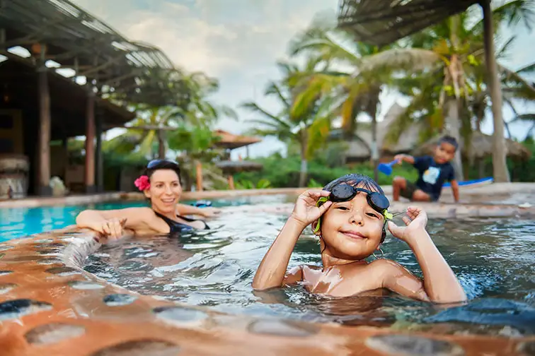 Kids Playing in Pool at Playa Viva in Mexico