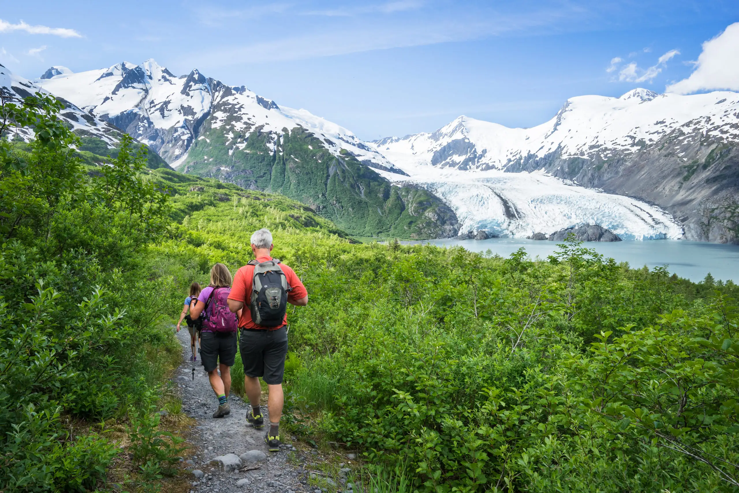 People hiking in Portage Pass