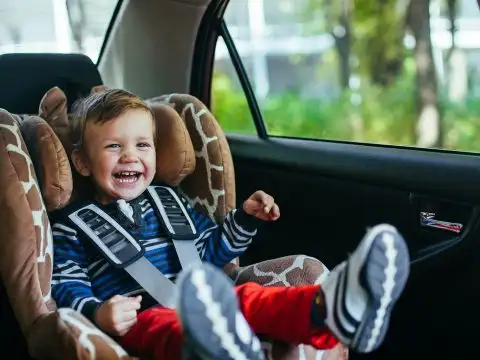 Toddler in Car Seat; Courtesy of David Tadevosian/Shutterstock.com